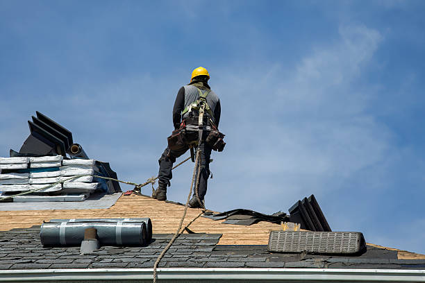 Professional Storm Damage Roof Repair technician working in Readville, MA